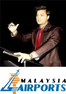 Gaurang Harit with Malaysian Airports logo
